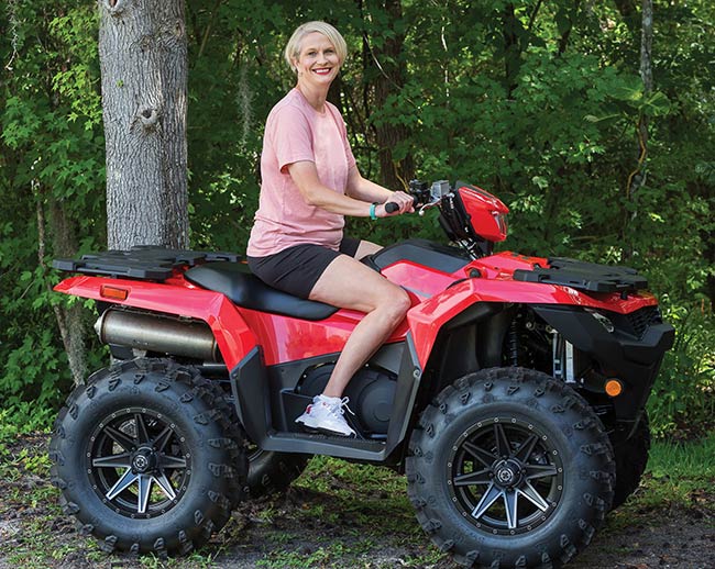 Michelle Sitting on Red ATV